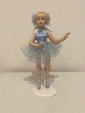 Porcelain ballerina doll with stand
